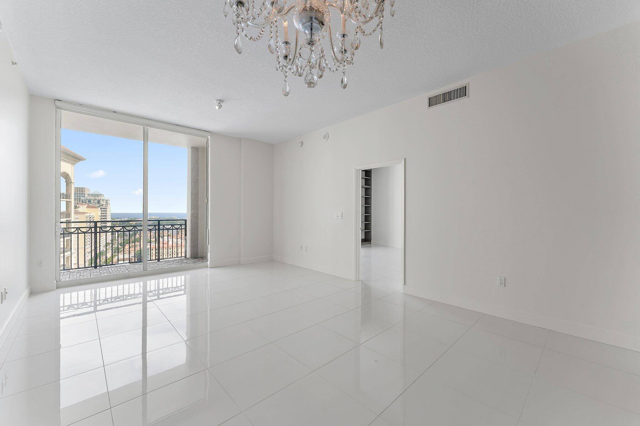 This east facing condo in West Palm Beach offers panoramic views of the intracoastal, Palm Beach, and the ocean.