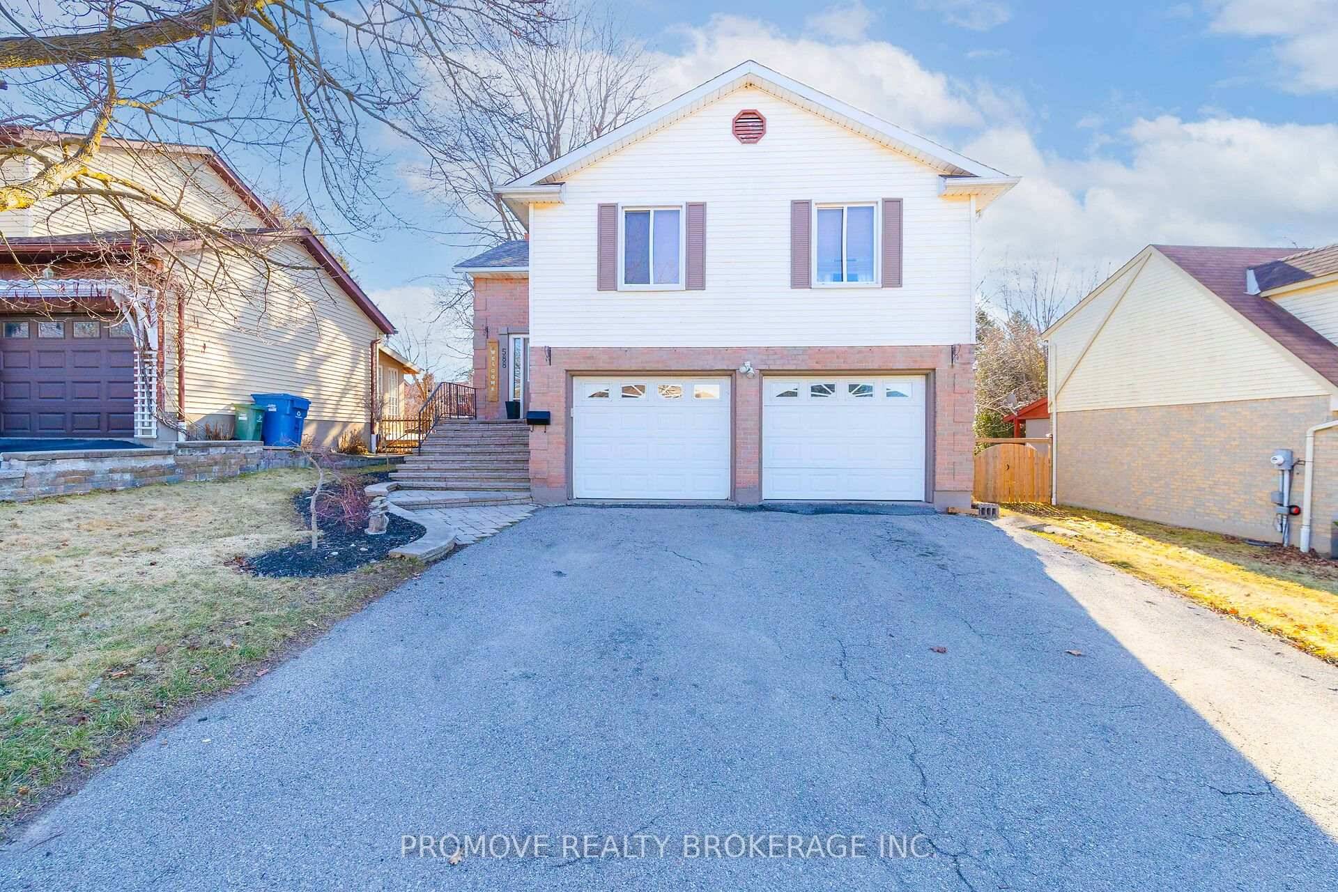BEAUTIFUL DETACHED HOME with HUGE BACKYARD DOUBLE CAR GARAGE !
