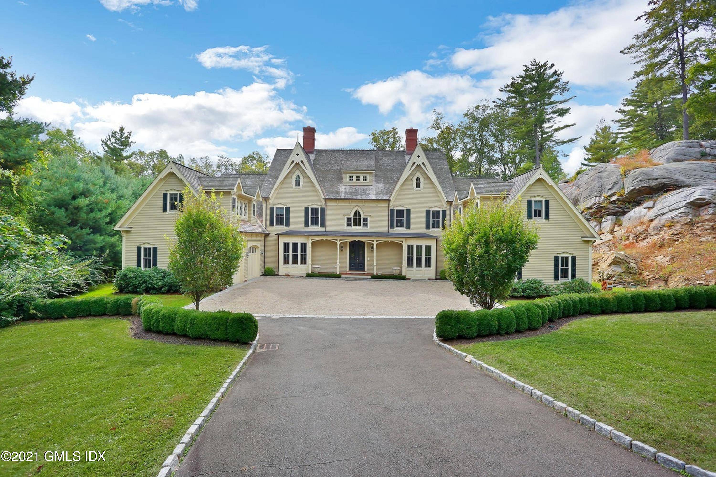 Elegant six bedroom home set back on 5.