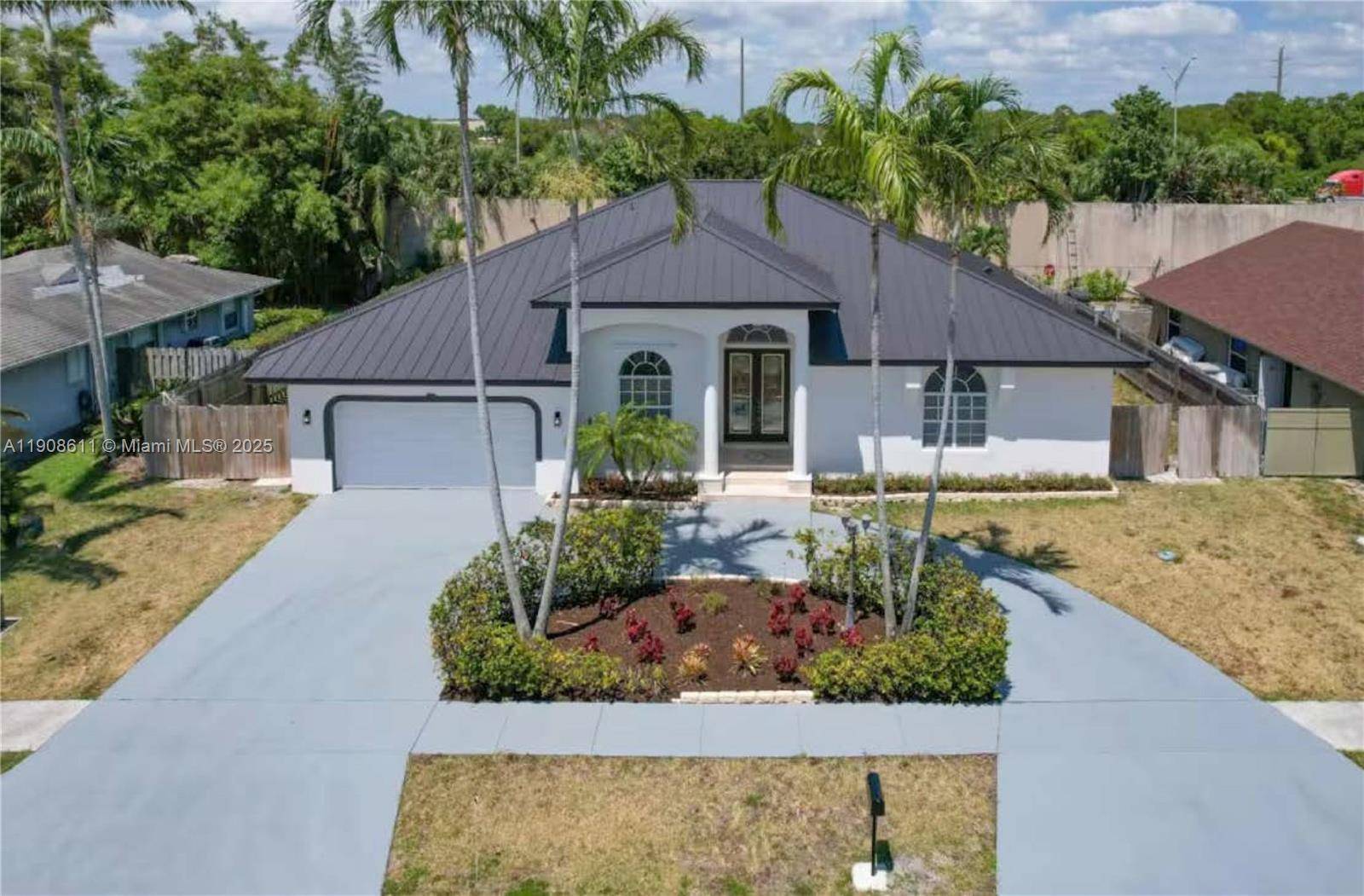 Welcome to your fully renovated coastal retreat in Boynton Delray Beach !