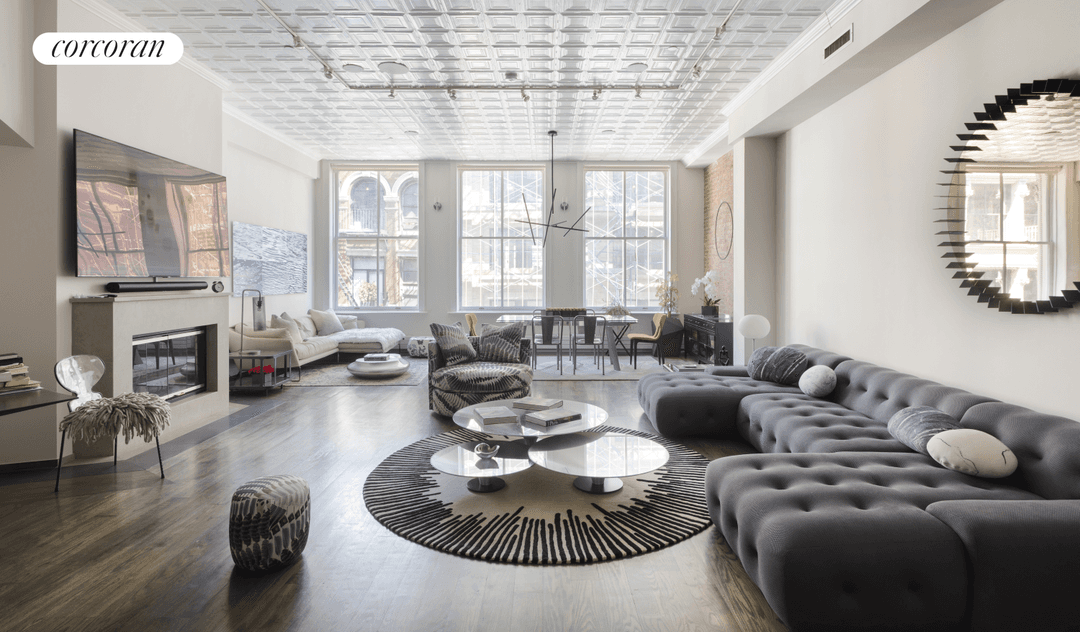 This downtown home with soaring ceilings is the definition of NYC loft living.