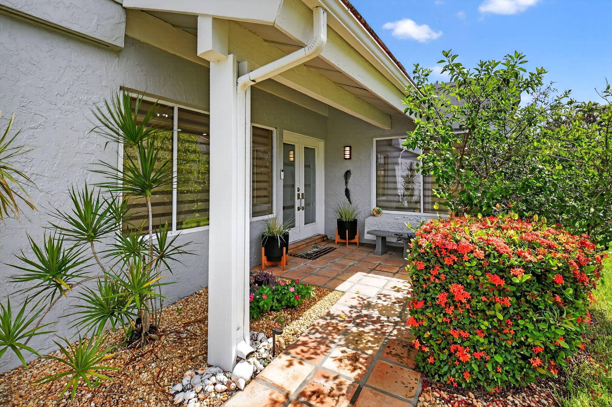 Welcome to this elegantly updated residence where modern charm meets timeless style.