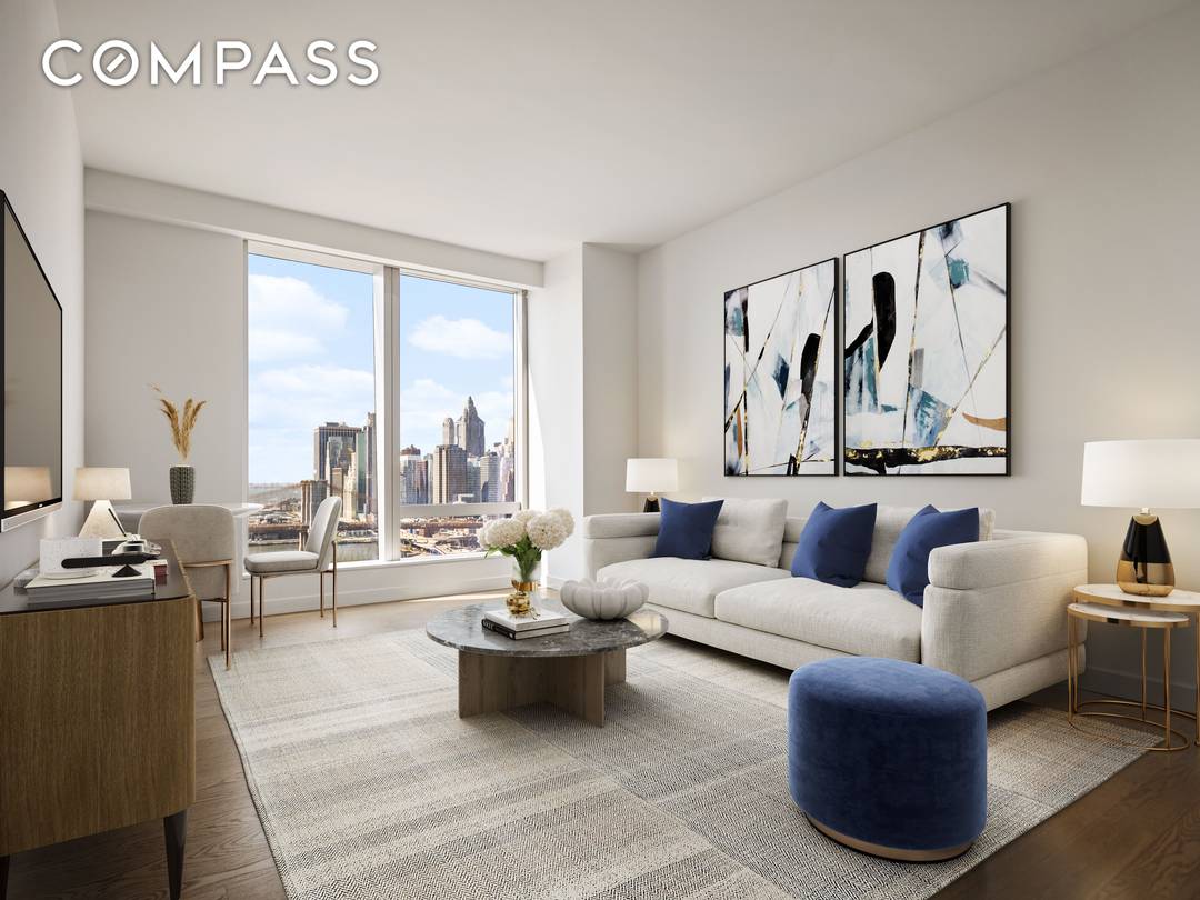 Residence 28C is a 695 square foot one bedroom, one bathroom home offering spectacular southwest facing views of the Manhattan Bridge and East River.
