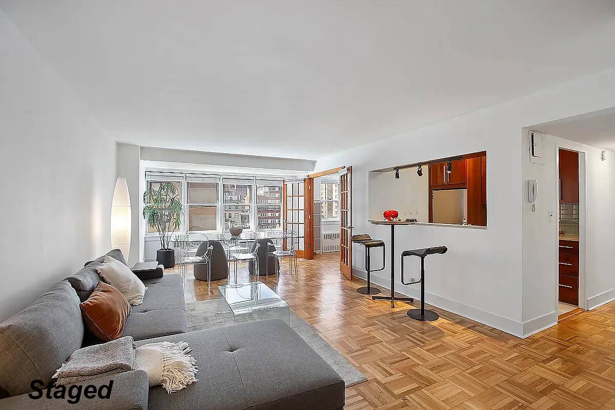 Sun drenched high floor convertible two bedroom fully furnished in the heart of Murray Hill.