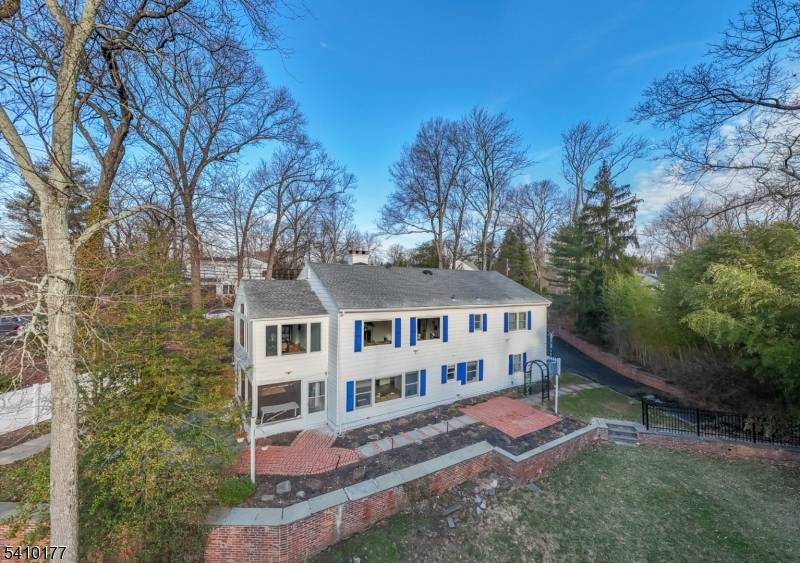 MID CENTURY MODERN RANCH IN MARVELOUS SHORT HILLS IS A MUST SEE !