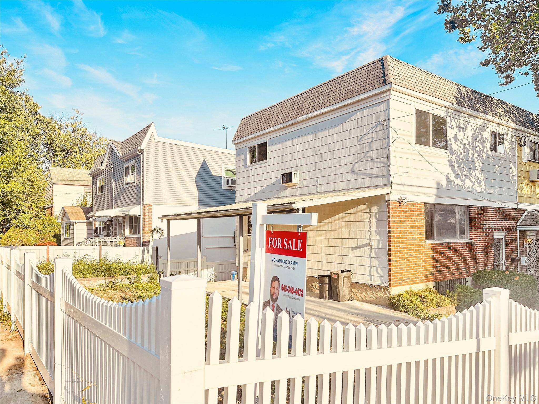 Discover this beautifully renovated south facing corner fenced property in the heart of Throggs Neck !