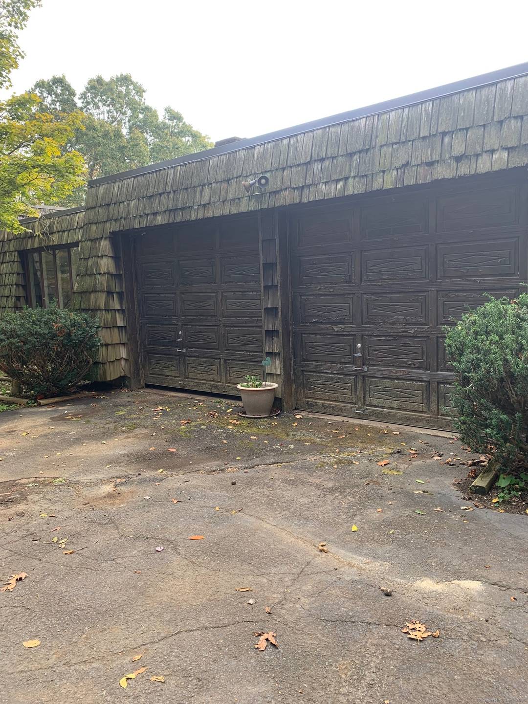 Home is a 6 BR 4. 5 bath split level 2 fireplaces with 2 car garage on 2.