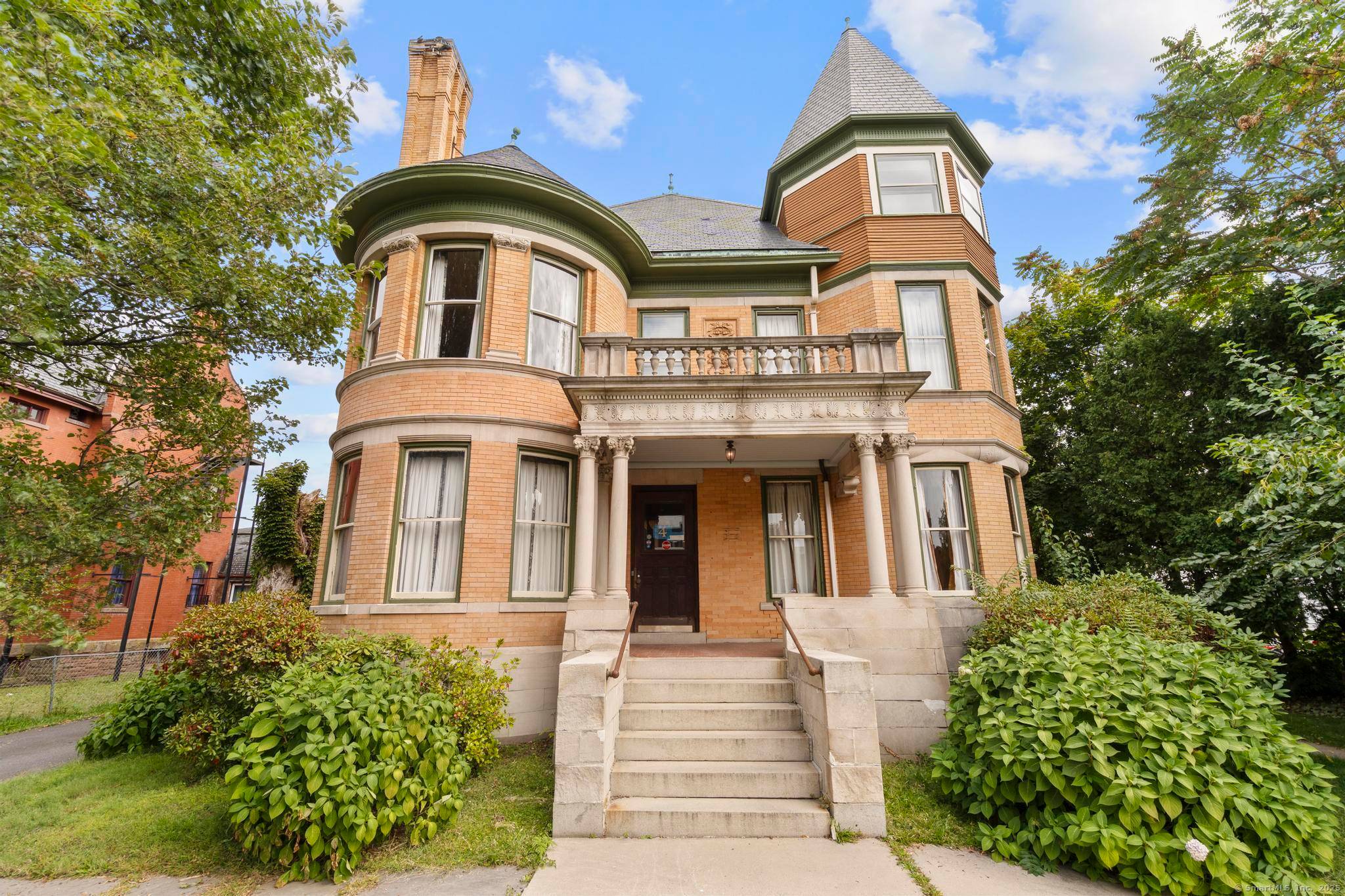 Welcome to 14 Wethersfield Avenue, an impressive mixed use 7, 188 SF brick Victorian set on a.