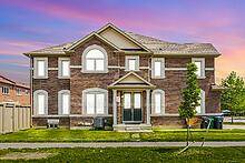 Sun drenched corner lot, steps to transit and top ranked schools this move in ready home delivers space, style, and built in rental income.