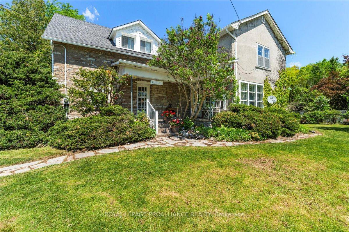 Charm and character shines through in this century limestone stucco home in the heart of the Village of Tweed.