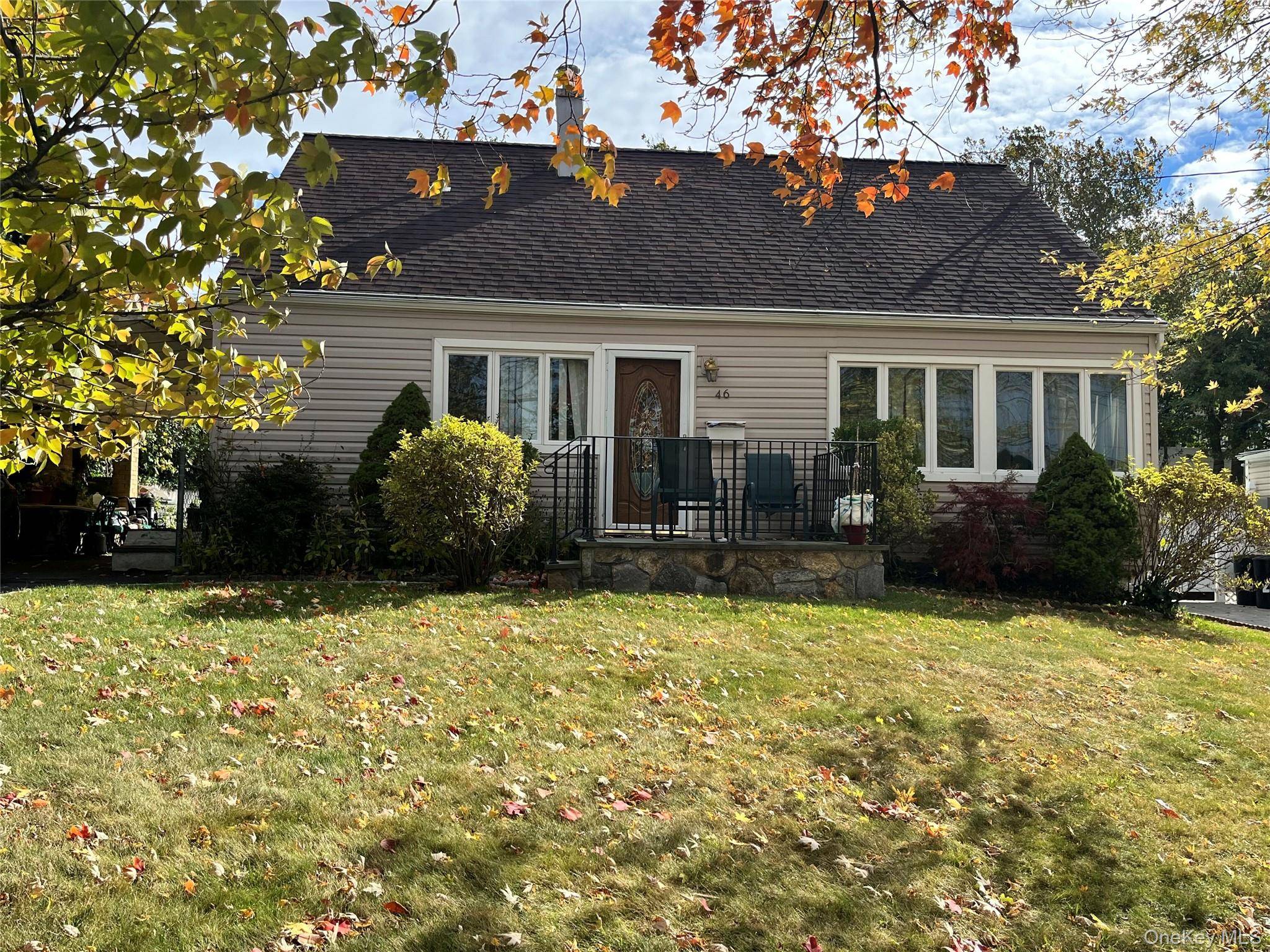 Welcome to this charming Cape Cod home nestled in the desirable Sprain Lake Knolls neighborhood of Yonkers.