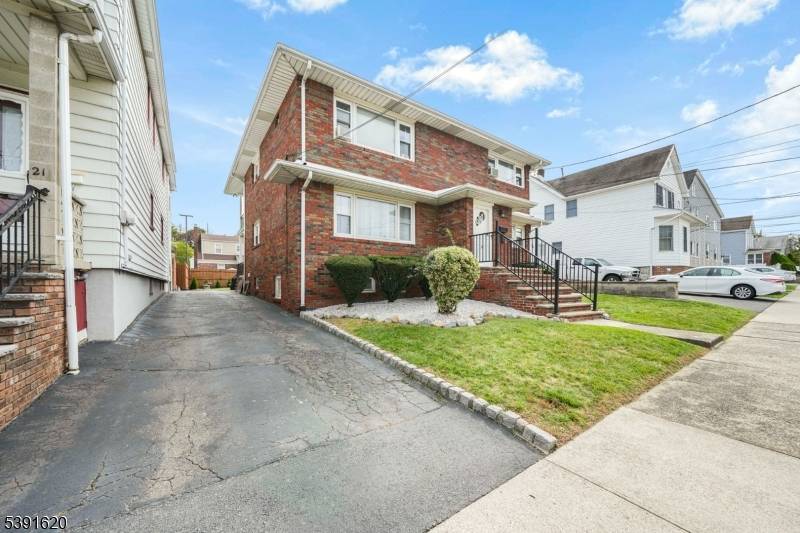 Welcome to this beautifully maintained brick multi family home !