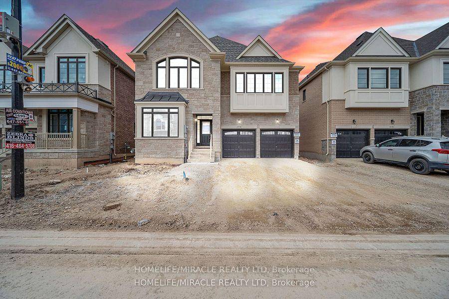 Absolutely Stunning, Brand New, Never Lived In Detached Home in One of Milton's Most Desirable Communities !
