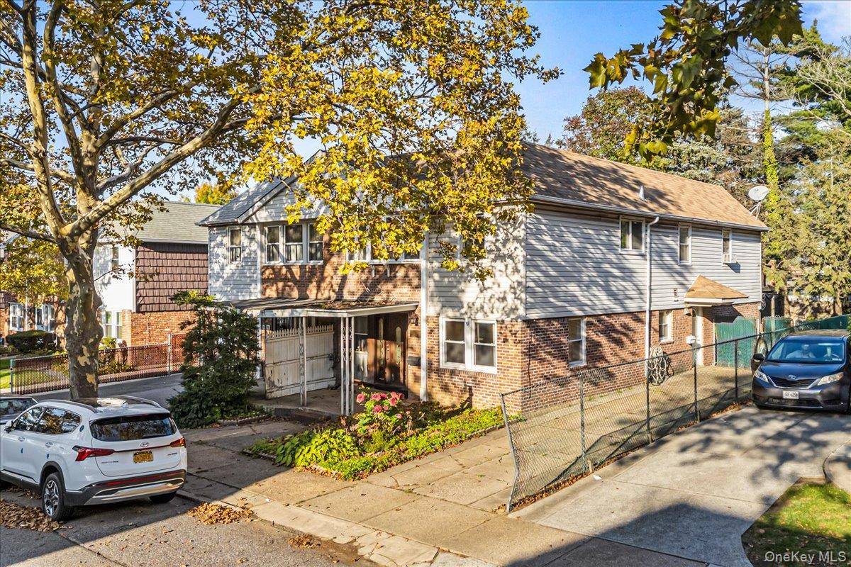 Welcome to Charming Two Family Home in Prime Oakland Gardens, a beautifully maintained brick frame two family semi detached home offering over 2, 200 sq ft of living space in ...