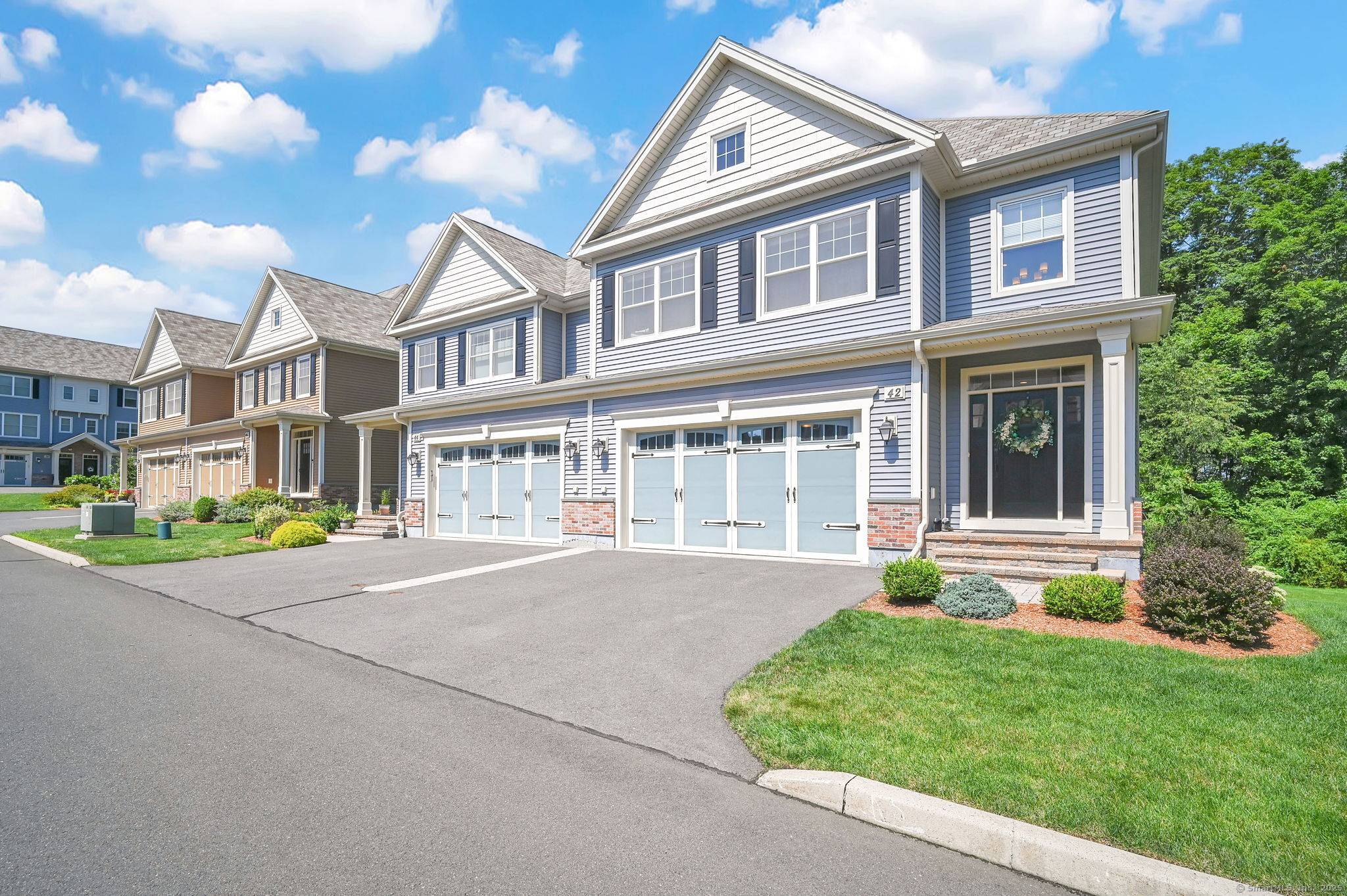Fall in love with 42 Harvest Court, located in the sought after community of Harvest Village.