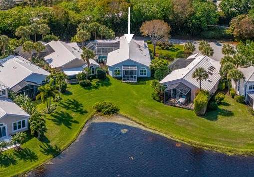 Rarely available, this beautifully redesigned CBS single story courtyard home is ideally positioned within the prestigious Bridgegate community of Jonathan's Landing.