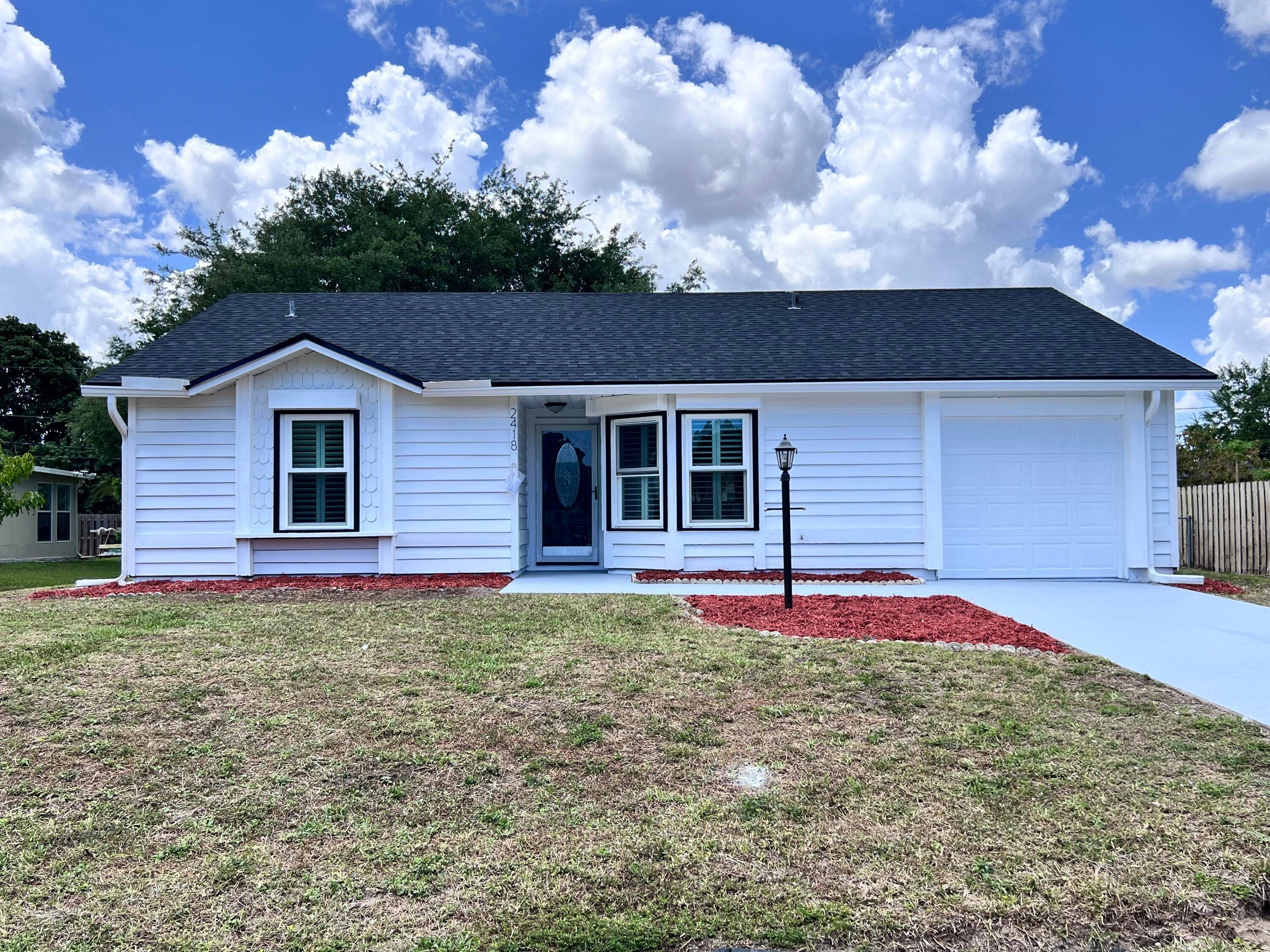 Beautiful completely renovated 3 bedroom, 2 bathroom home nestled in the desirable Sandpiper Bay neighborhood of Port Saint Lucie.