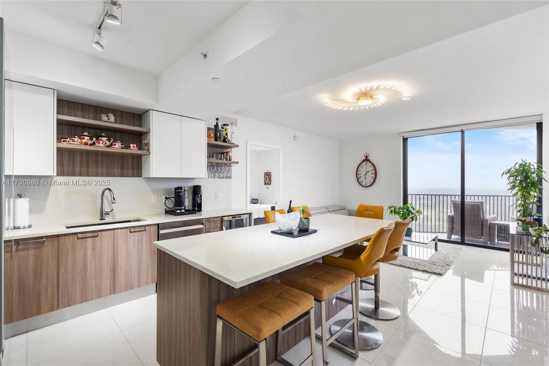 Welsome to this MAGNIFICENT and completedly remodeled unit in the heart of Downtown Doral where luxury and elegance become one.