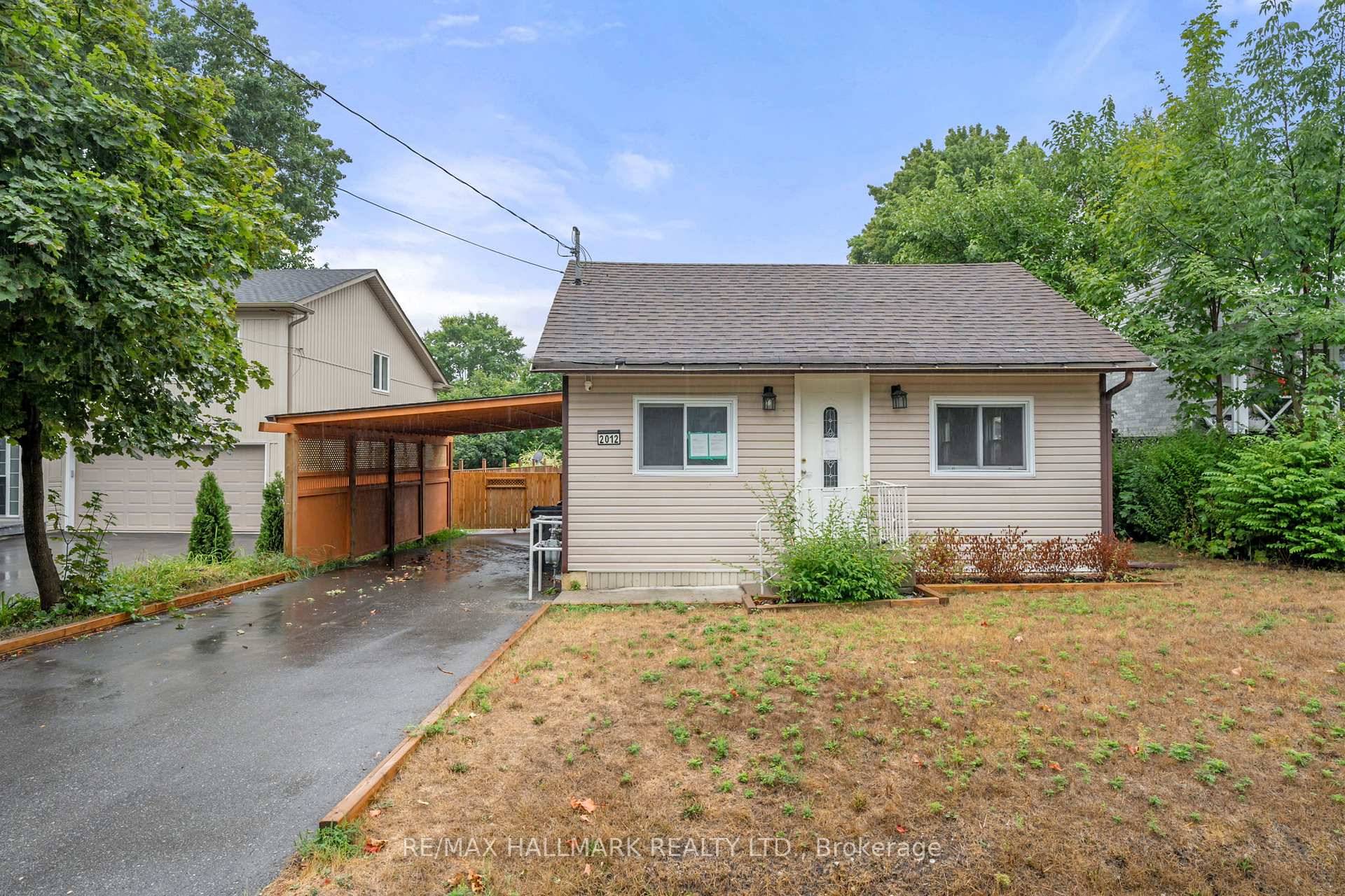 Welcome to this rare opportunity in the heart of Alcona, just steps from the shimmering shores of Lake Simcoe.