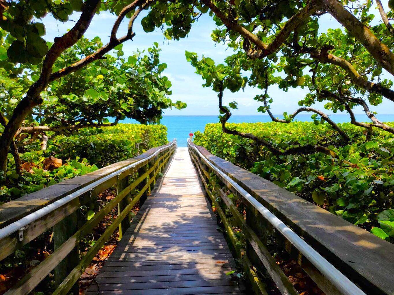 Just bring flip flops ! TURNKEY FULLY FURNISHED FLORIDA BEACH VACATION HOME, STEPS TO BEACH !