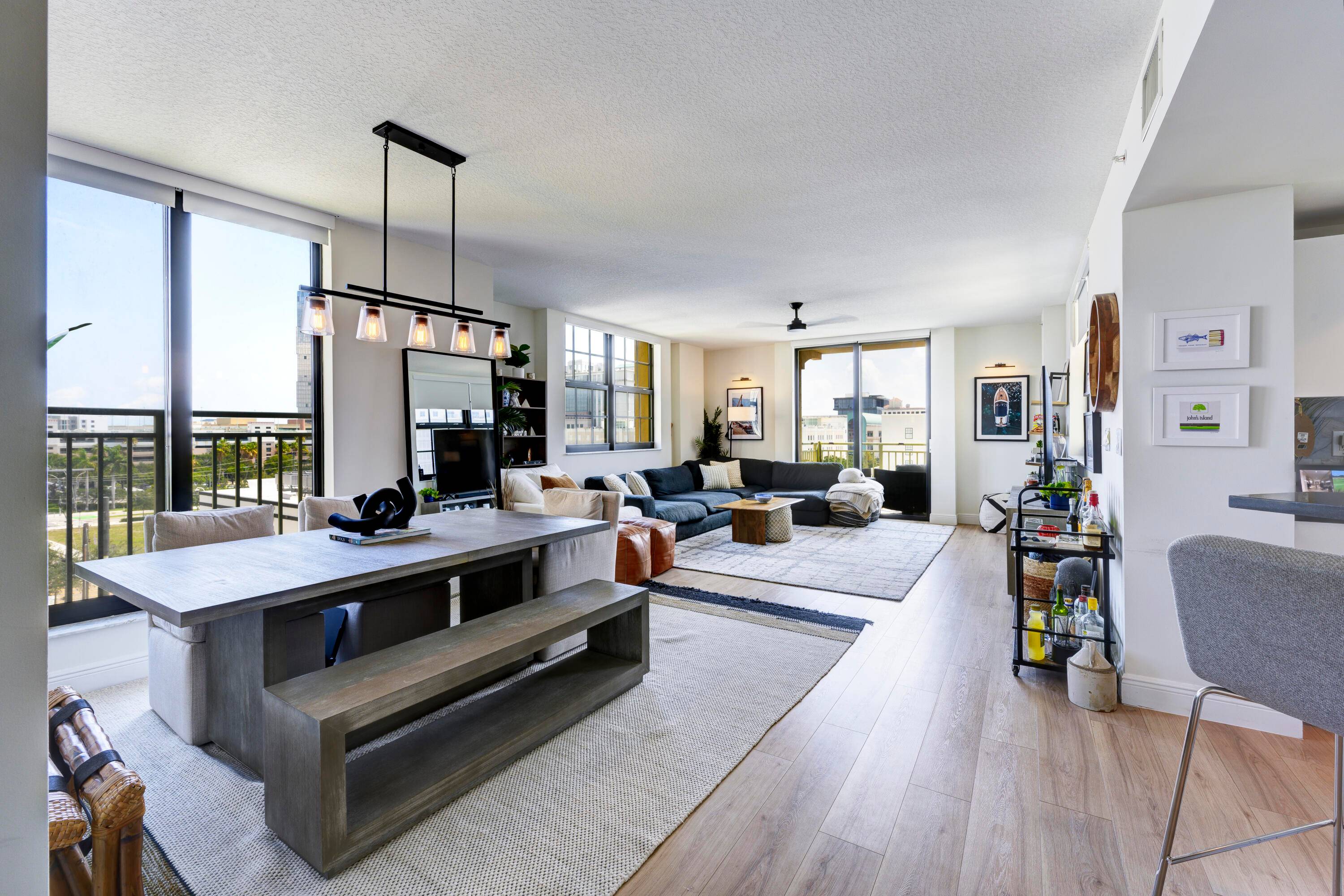 Step inside this wonderfully renovated and fully appointed corner condo unit looking directly down famed clematis street in the true heart of Downtown West Palm Beach !