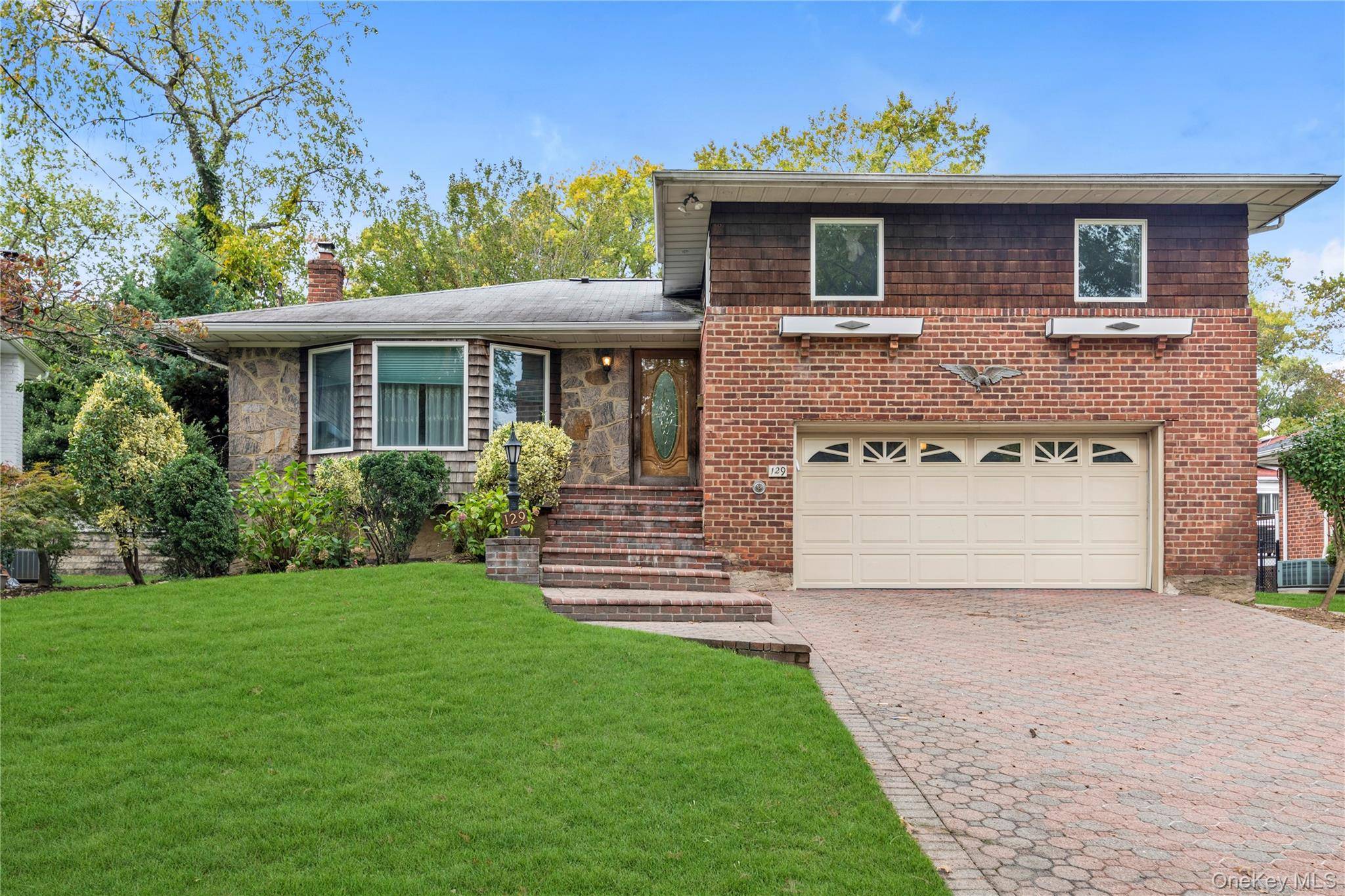 Welcome Home to this Split level Brick home in Stratford community, Primary Bedroom with private bath, Large eat in kitchen, Formal Dining Room, Formal Living Room, Den, Finished Basement, New ...