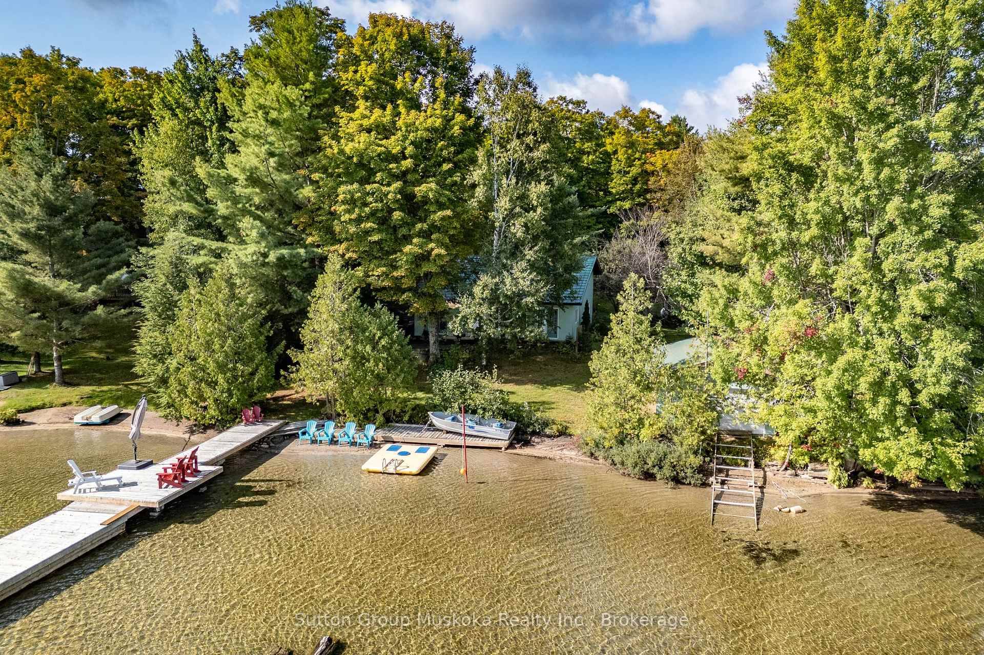 Picturesque four season cottage or home nestled into a beautiful bay on pristine Skeleton Lake.