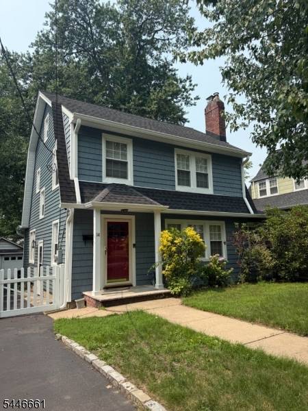 This charming side hall colonial is bathed in natural light, boasting sun drenched rooms and a white kitchen with newer appliances.