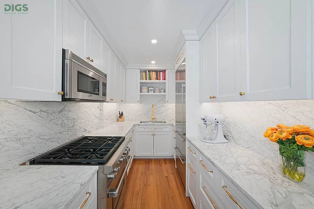 Welcome to this beautifully renovated two bedroom, one bath residence in a charming boutique doorman co op in the heart of Carnegie Hill !