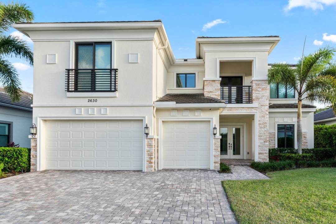 Exceptionally upgraded Callahan model in prestigious Royal Palm Polo, perfectly positioned on a private lot.