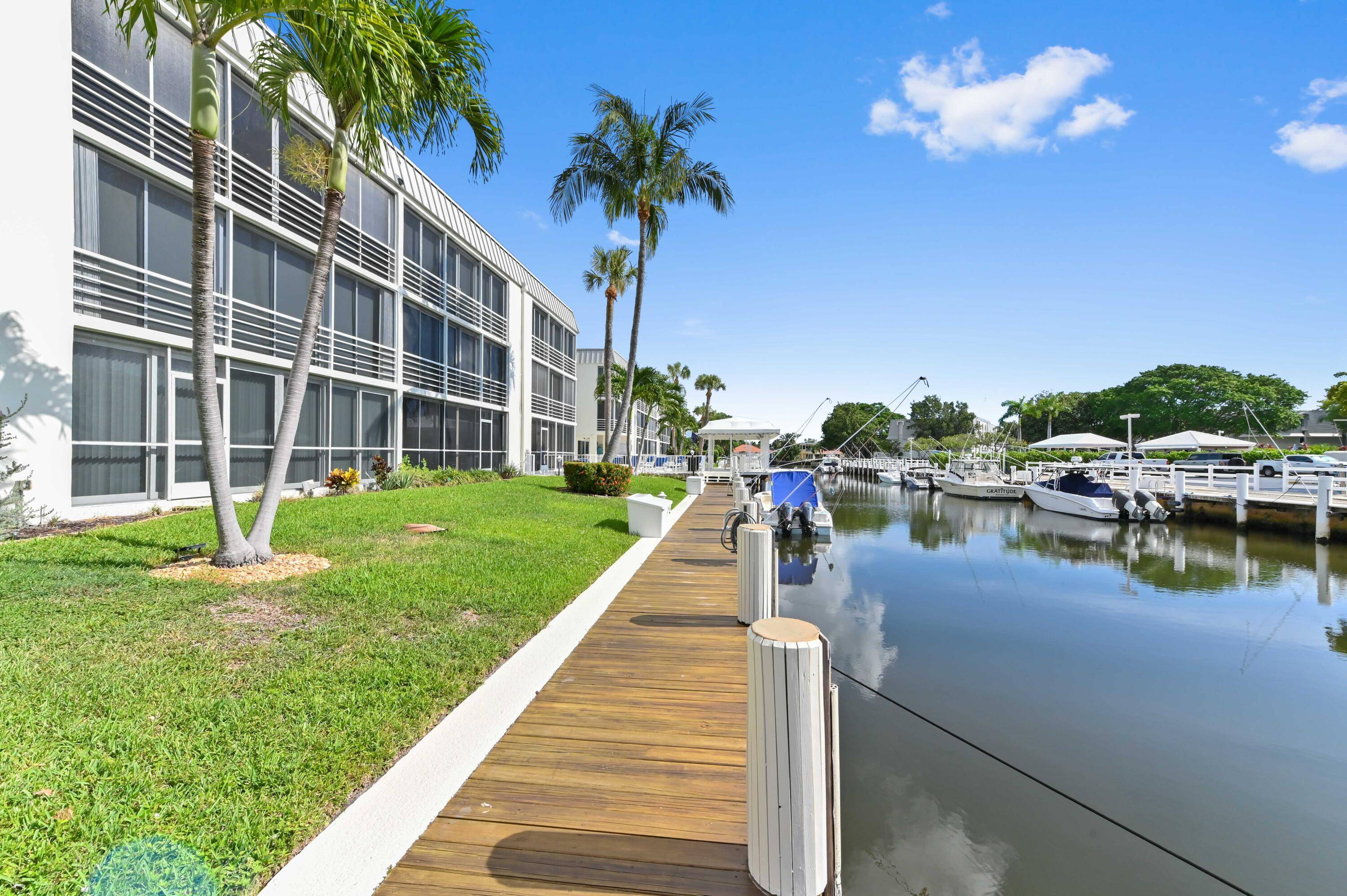 Gorgeous, fully furnished, 2 2 waterfront condo backing to a canal with direct intracoastal access on the top floor with washer and dryer !