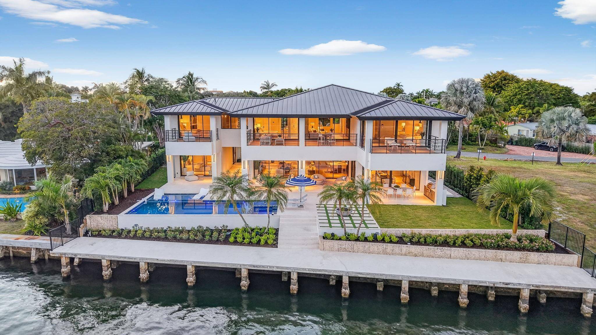 Located on a premier direct Intracoastal isle overlooking Birch State Park, this estate sits on nearly 16, 000 sf with 100 ft of waterfront.