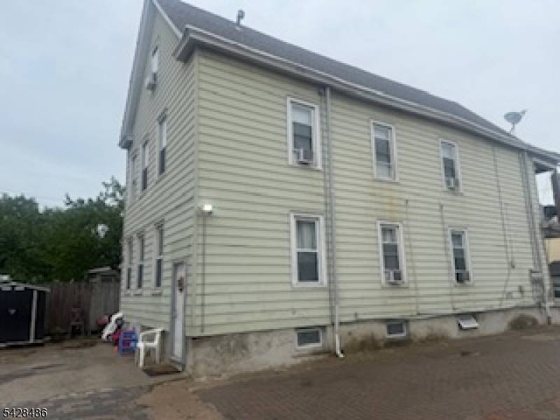 Extra large 2 family home on lot 37 x 101 with additional 25x 121 lot lots 11 12 1st and 2nd floor has living room, dinning room, 2 bedrooms and ...