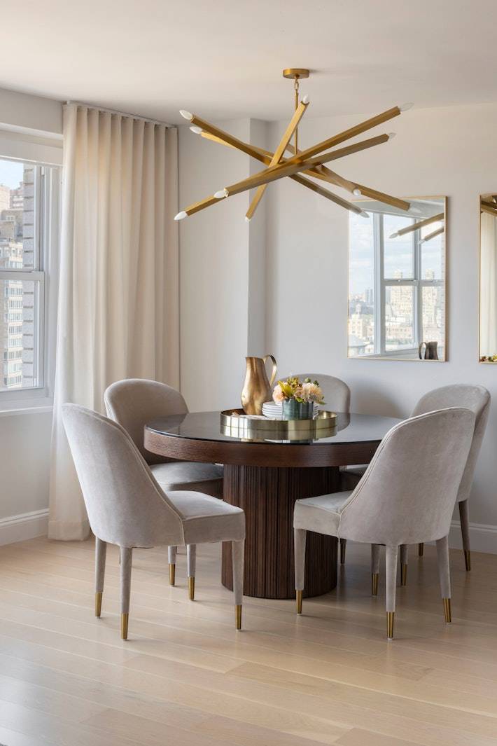 Residence 322 is a recently renovated, spacious corner home with bright northern and western exposures, offering charming city views from the primary bedroom.