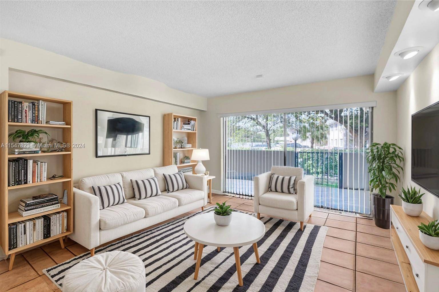 Discover Coral Gables charm with this pet friendly 2 2 unit by the Waterway.