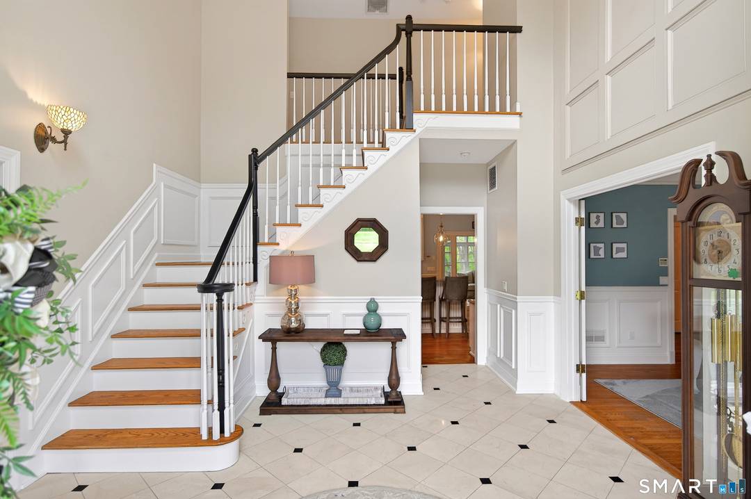 Set on 6 beautiful acres at the end of a quiet cul de sac, this spacious Colonial offers privacy, flexibility, and a wonderful lifestyle setting with western exposure.