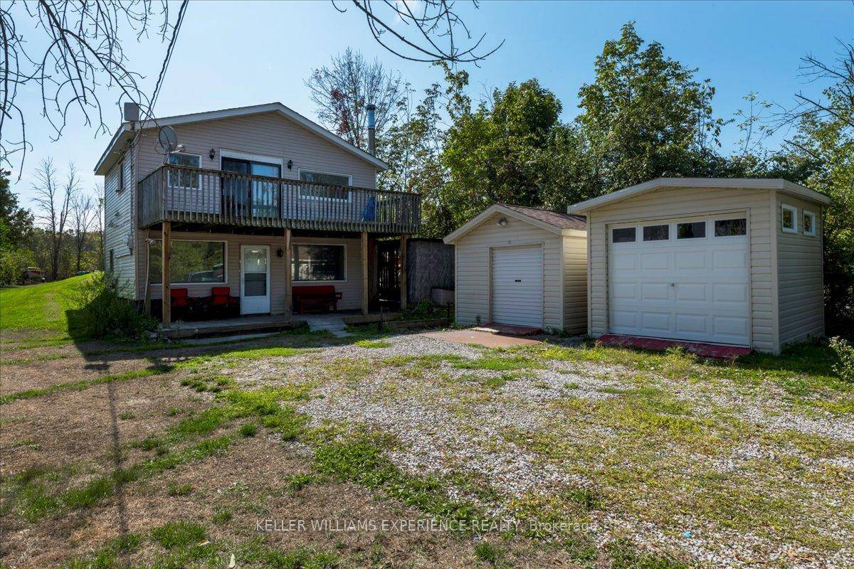 Opportunity Knocks ! Bring your vision and make this charming cottage 4 season home your own.