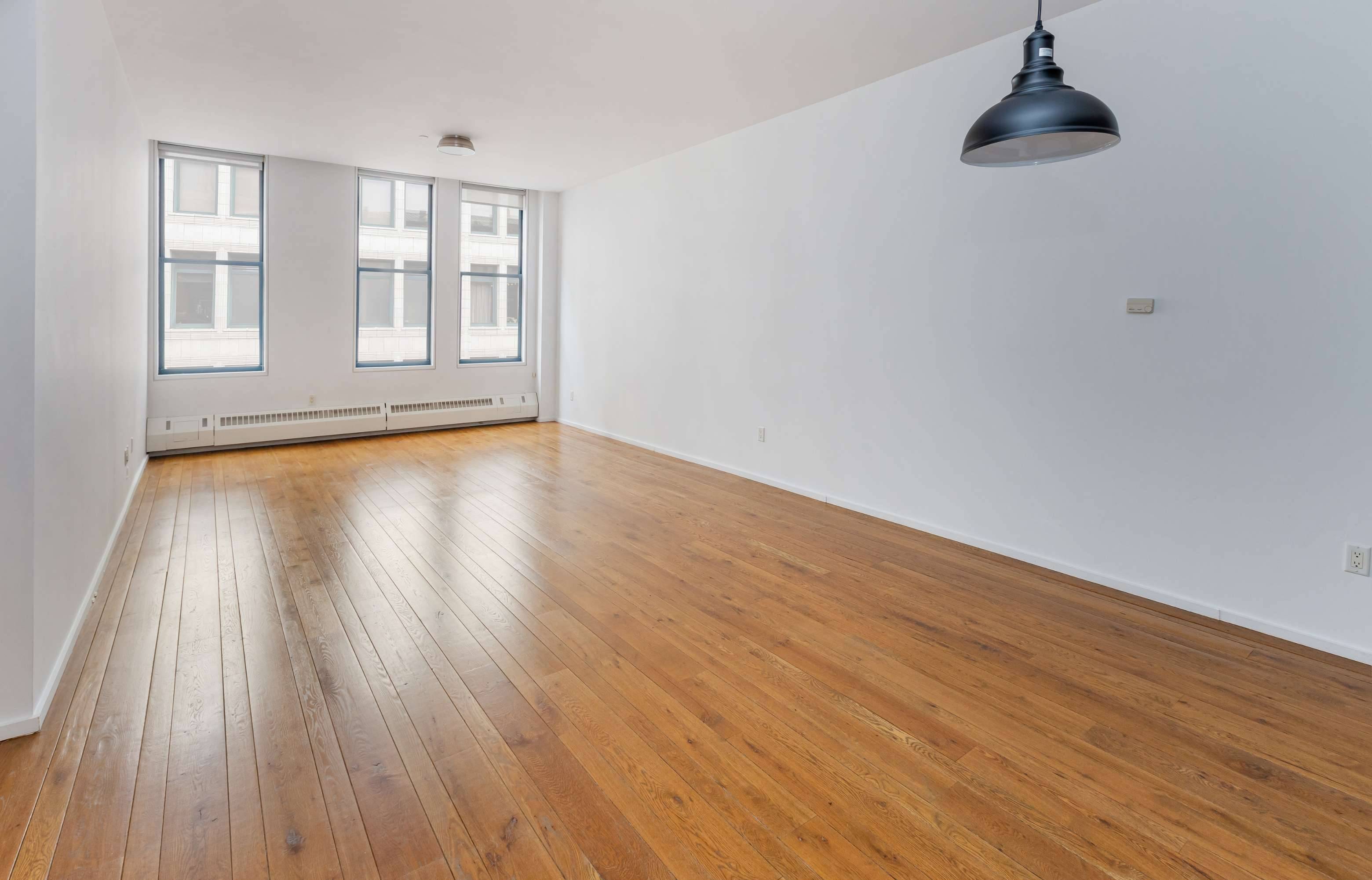 Discover unparalleled sophistication in this exquisite loft style residence at 21 Astor Place, Apt.