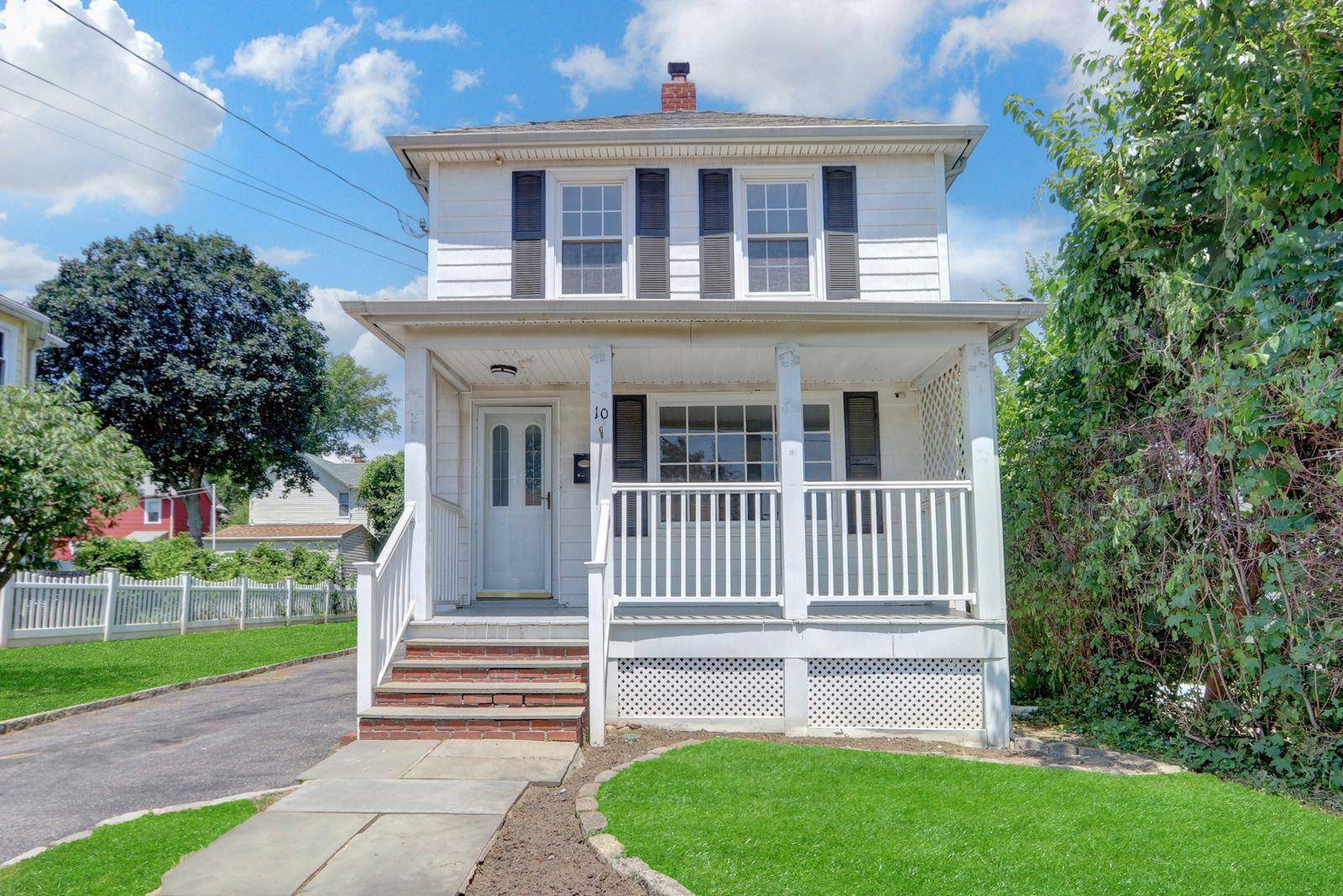 Welcome to 10 Valentine, a charming 3 bedroom, 2 bath house located in Glen Cove, NY.