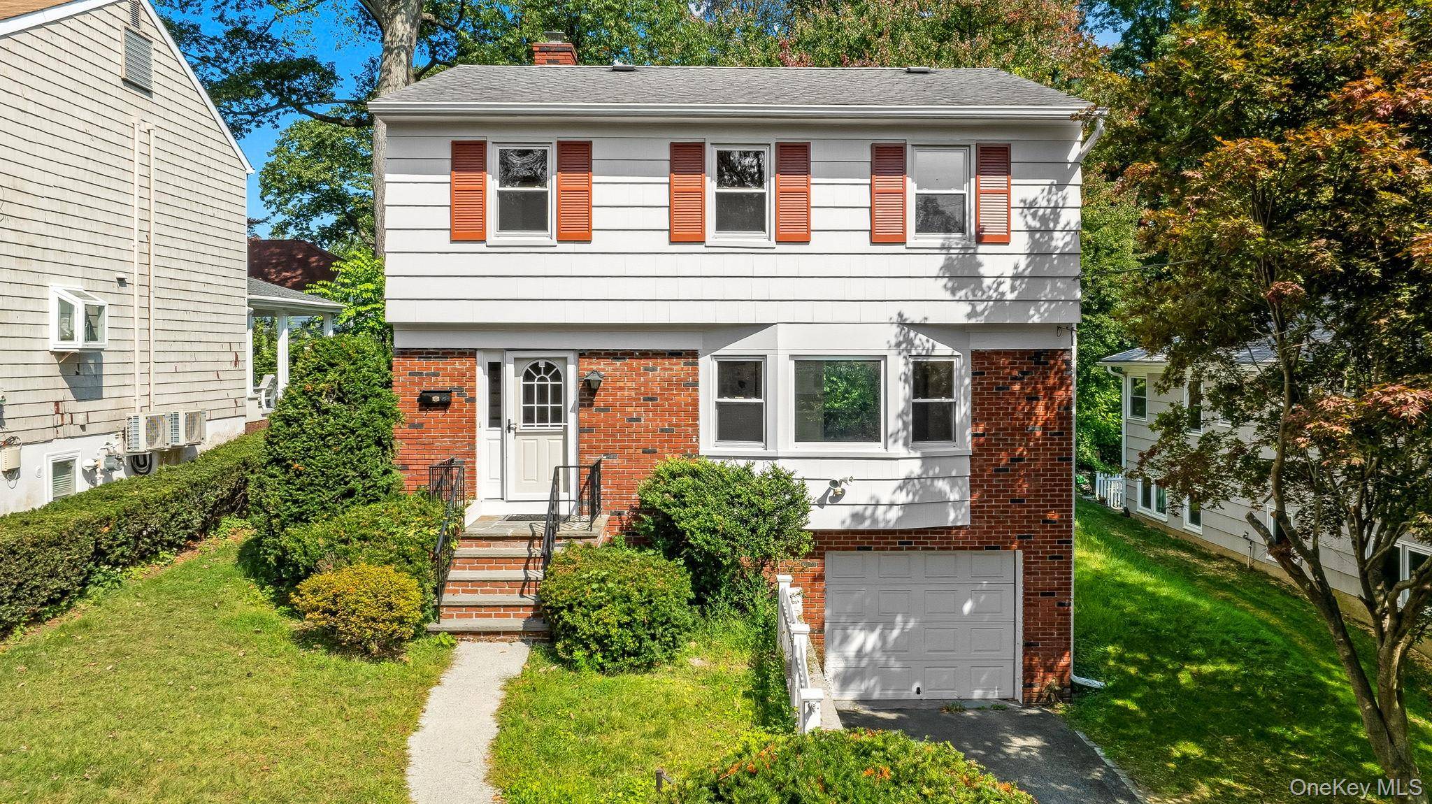 Welcome to 105 Sprague Road, a fabulous and centrally located Scarsdale Colonial close to schools and public transportation.