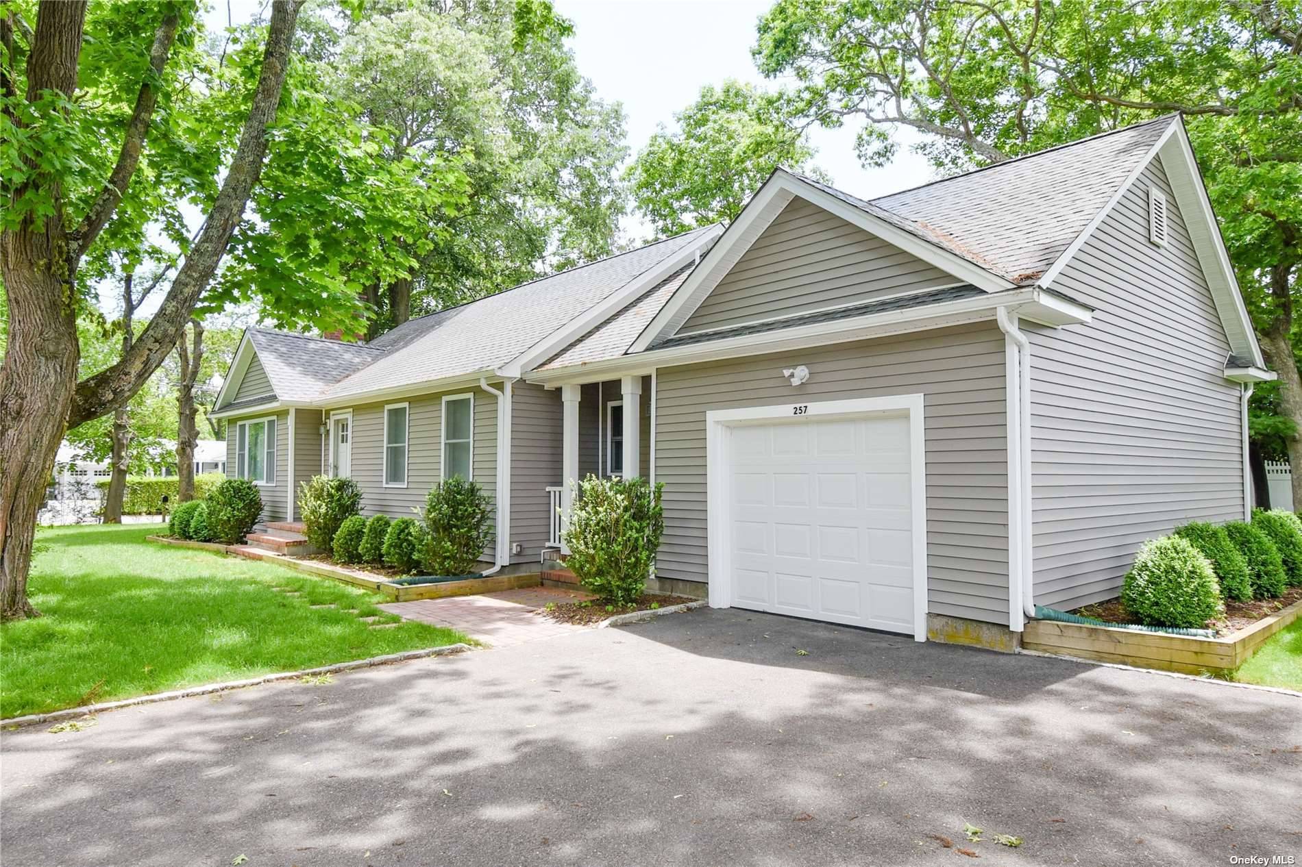 One level, recently renovated ranch south of the highway in the Village of Westhampton Beach offering 3 bedrooms, 1 full bathroom, living room with working fireplace and kitchen.