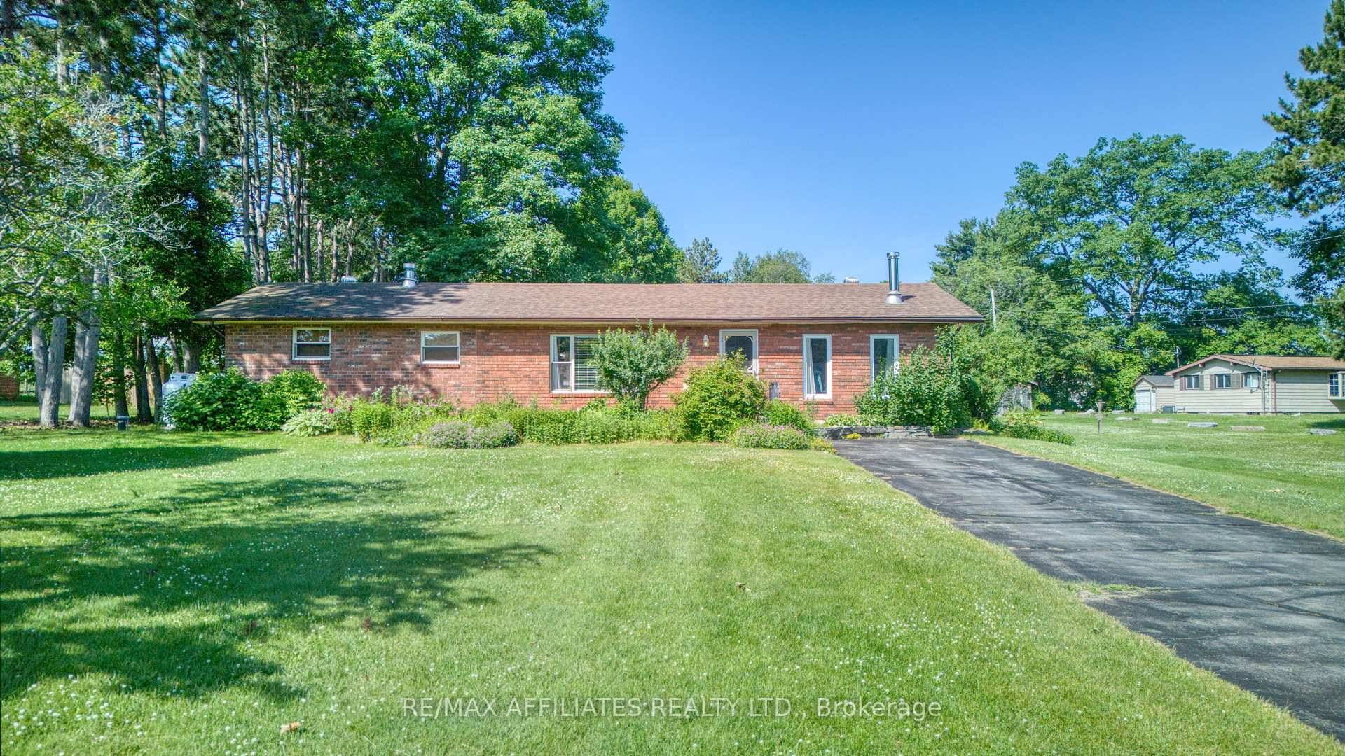 This tranquil Westport 3 bedroom bungalow is situated on beautiful Sand Lake.