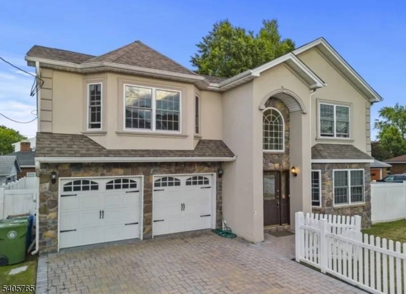 Welcome to 431 Raritan Rd, a stunning Colonial home built in 2013 and beautifully situated in the sought after Sunnyside section of Linden, NJ.