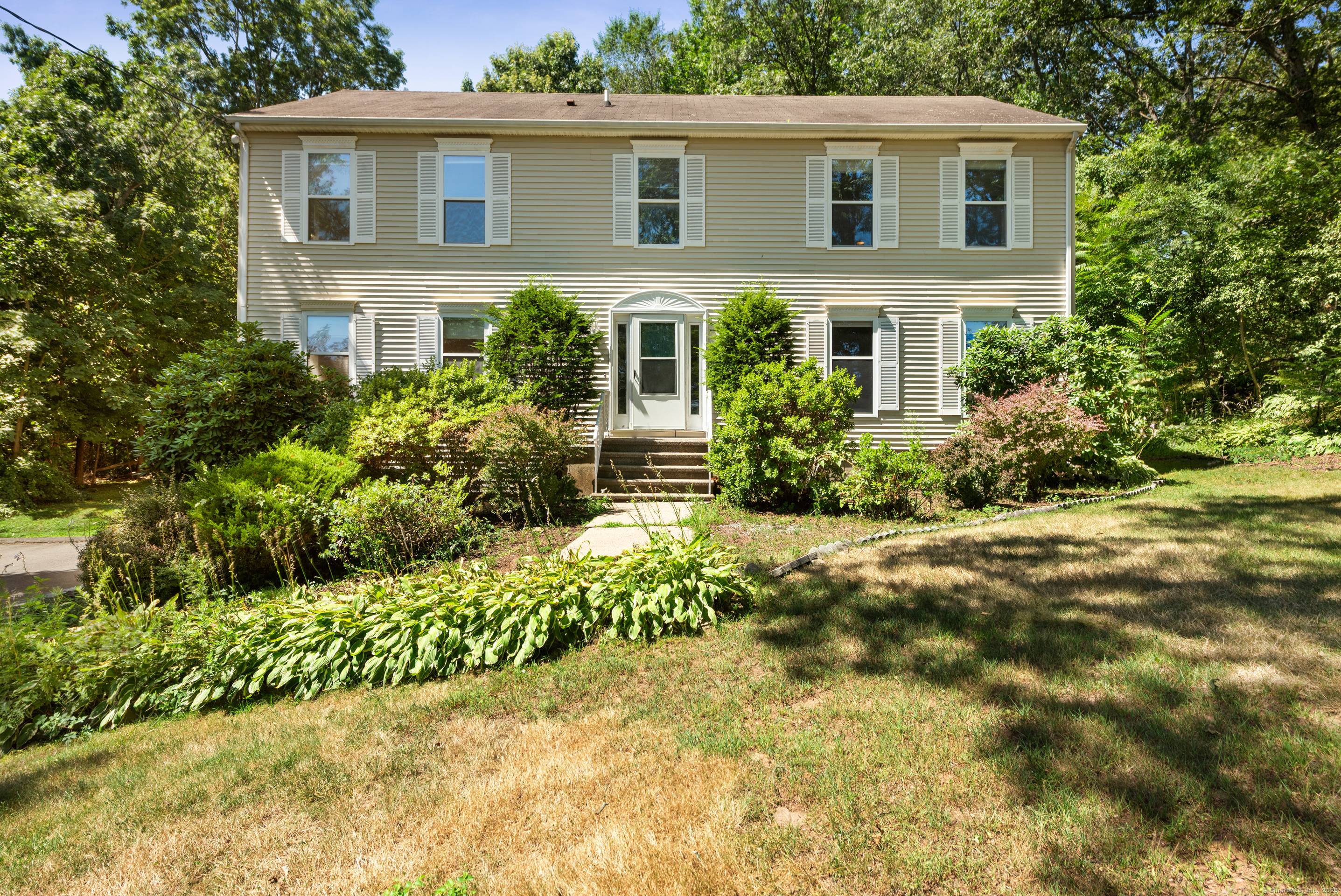 Welcome to this charming spacious Colonial Home with three large bedrooms and two and half bath, located in the Ridge Road school district.