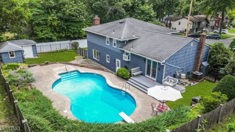 Tucked away at the back of a quiet cul de sac, this brick accented gem sits on a beautifully level landscape lot with a sparkling in ground saltwater pool with ...