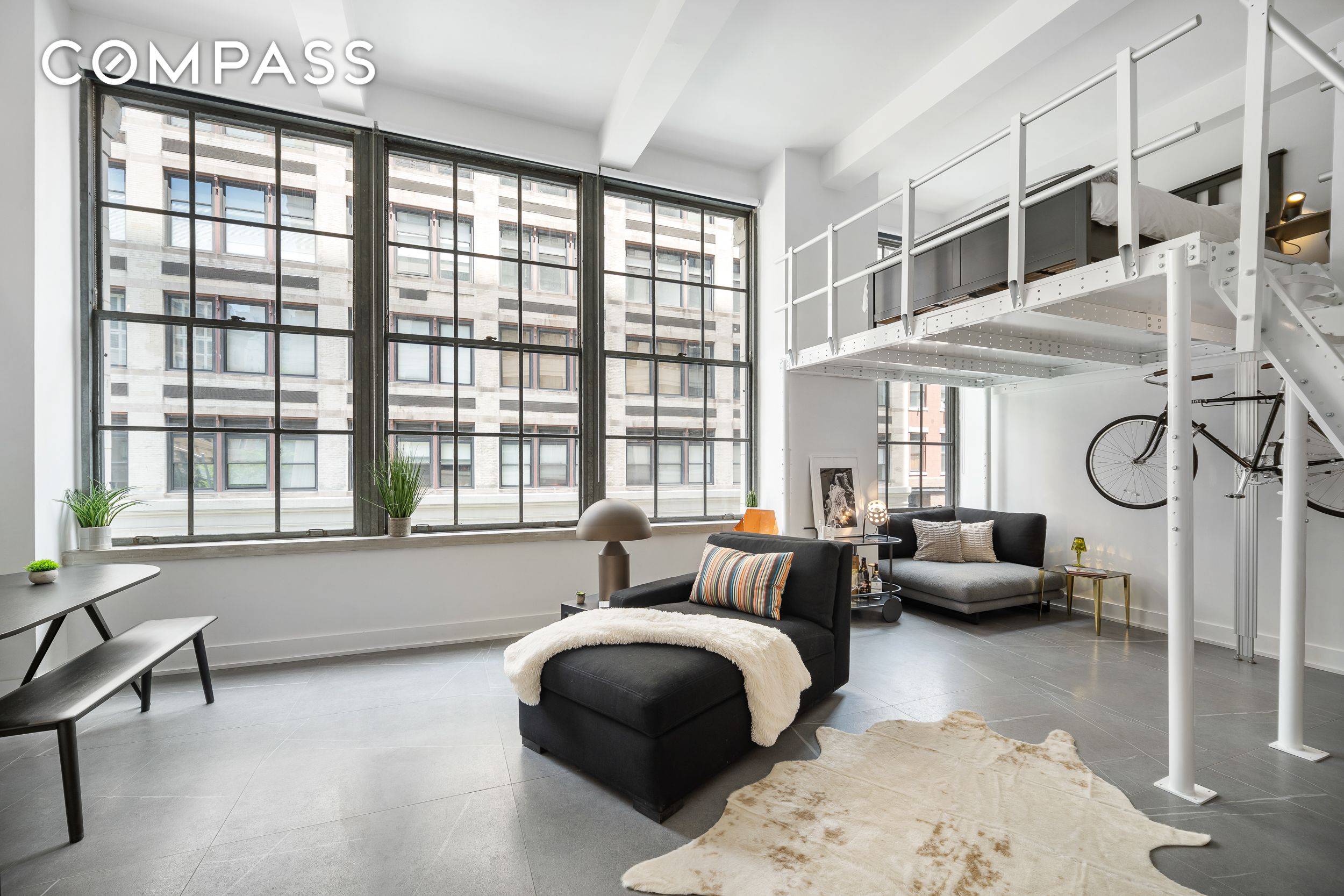 This incredibly unique, 1 bedroom loft apartment is on the SECOND FLOOR and perched above a double height ground floor of the International Tailoring Company Building, which is one of ...