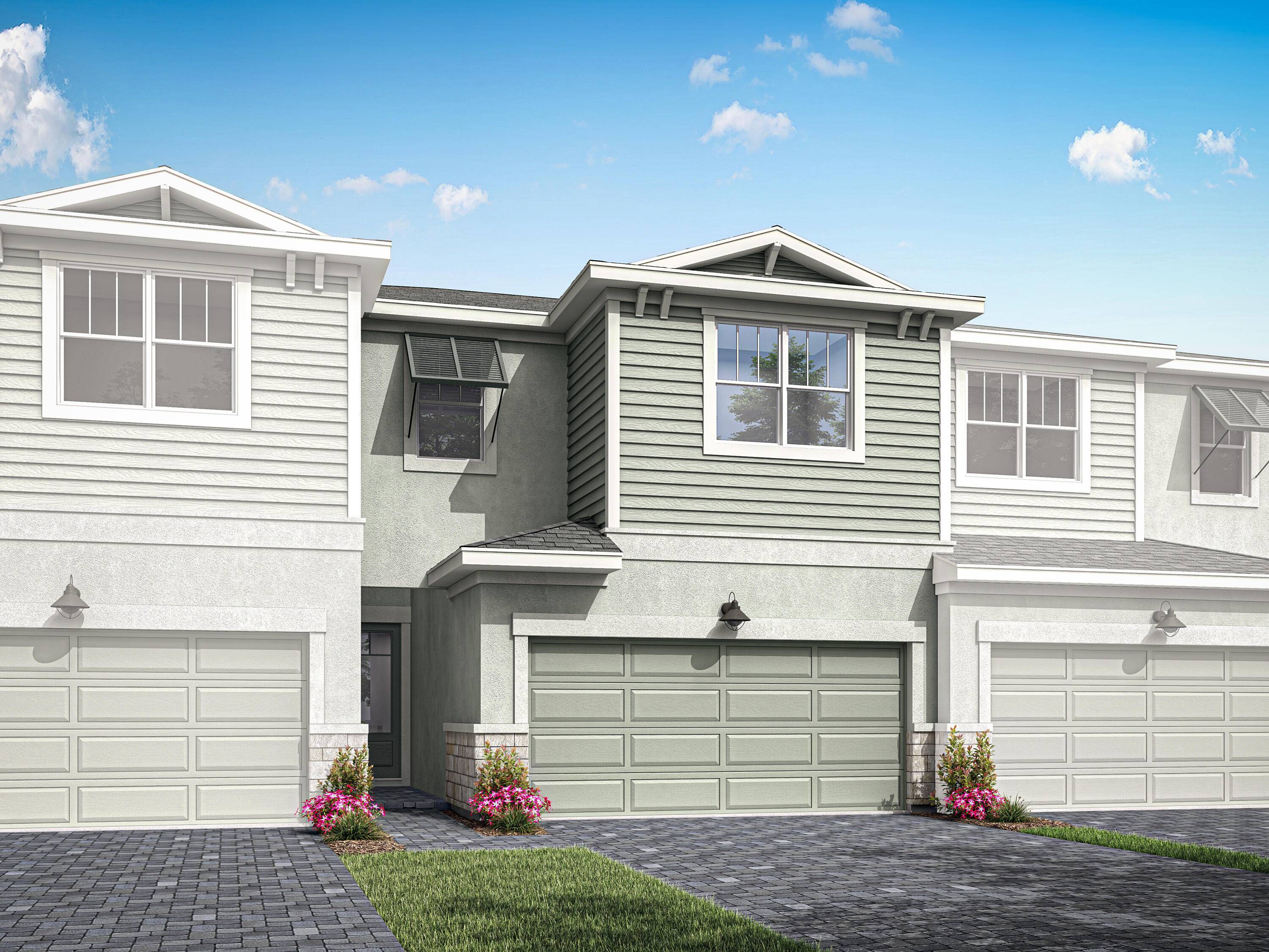 Step into the two story foyer of this exquisite 1, 865 sq ft townhome and you are greeted by spacious comfort.