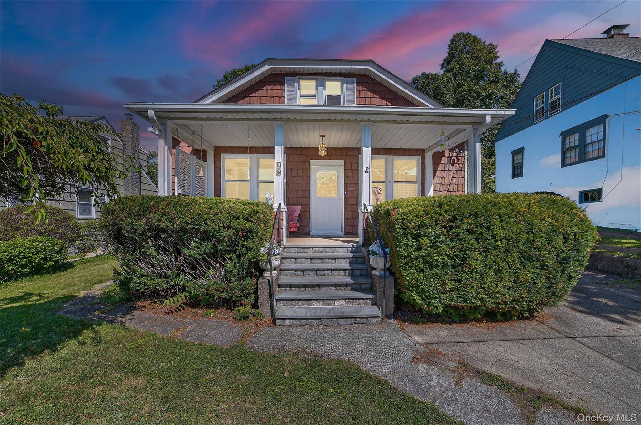 Charming front porch bungalow style village home on quiet street offering walking distance to village center, schools, shops, library, RR station and parks.