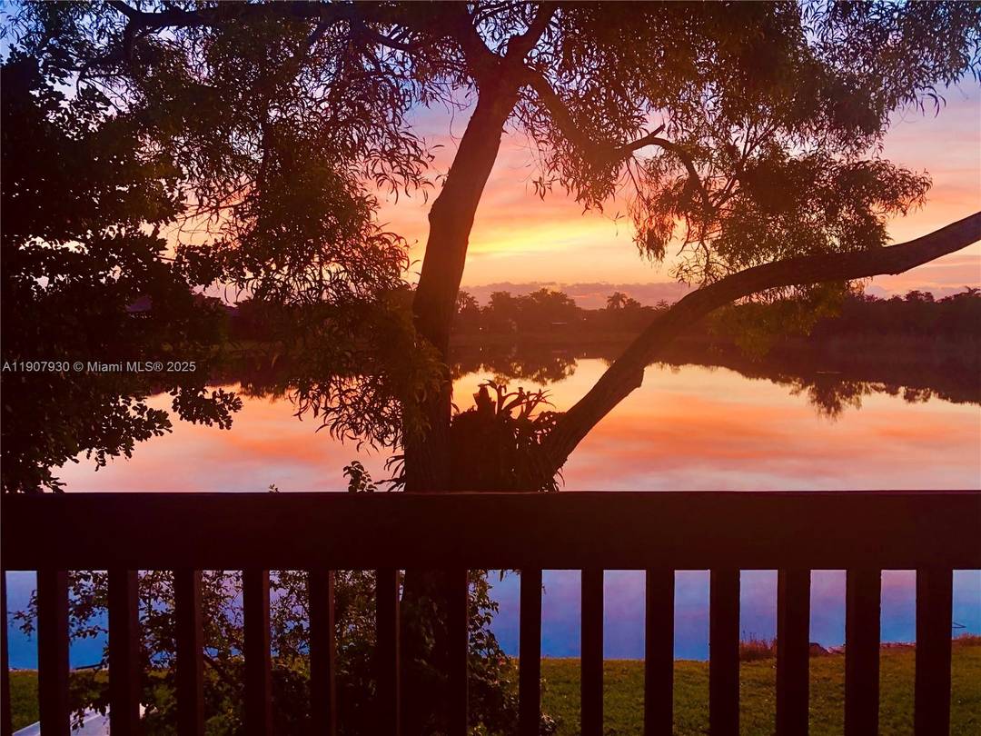 Wake up to peaceful Indian lake views and live the South Florida dream in this rare 2 story waterfront townhome on the Davie Cooper City line.