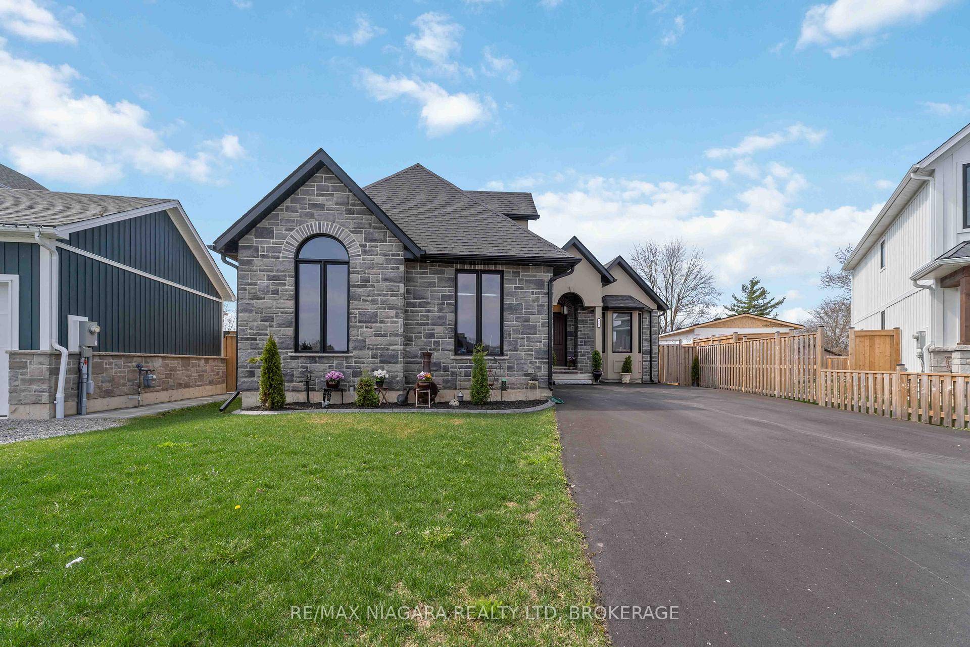 Welcome to this beautifully crafted executive bungalow built in 2022, set on a generous lot in the prestigious new Black Creek Niagara luxury community.